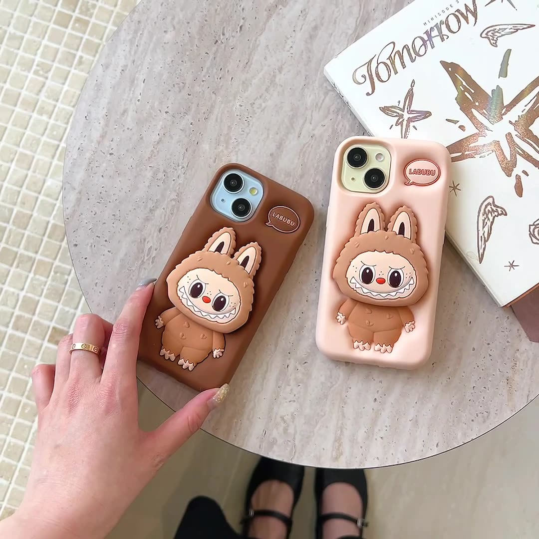 Labubu Silicone Phone iPhone Case Telescopic Stand Pressed Cream and brown On a Desk
