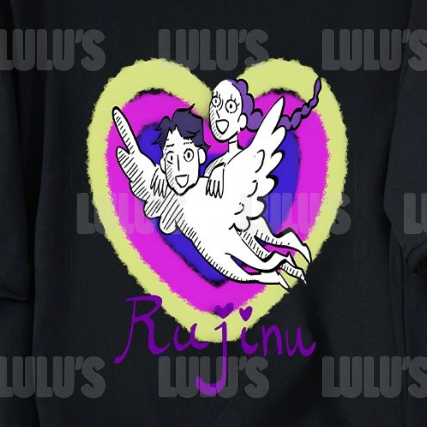 Detailed closeup of the Rujinu design on black fabric showing vivid heart colours and cartoon characters.