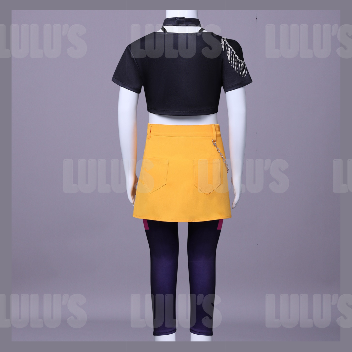 Back view of Zoey kids cosplay costume set, showing yellow skirt with chain detail and fitted purple leggings