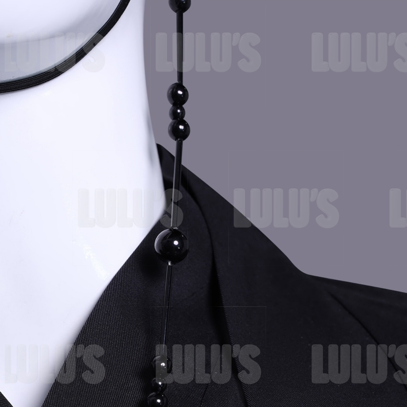Close up of Jinu costume gat hat chain tassels and accessory detailing for cosplay accuracy