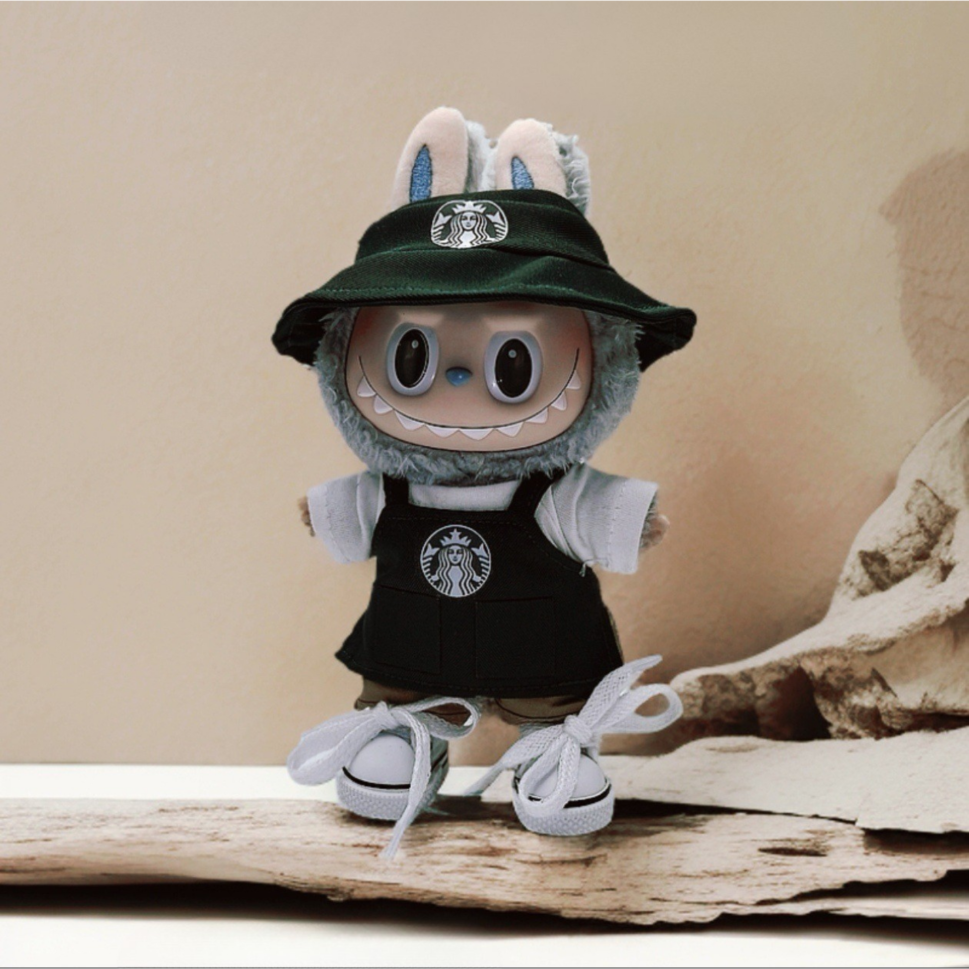 Labubu with 4-piece starbucks uniform wearing shoes
