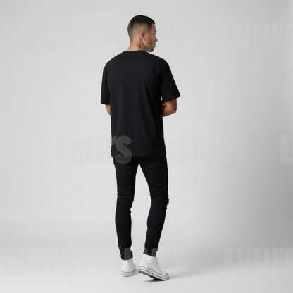 Male model wearing the black Rujinu T shirt shown from behind with relaxed fit.