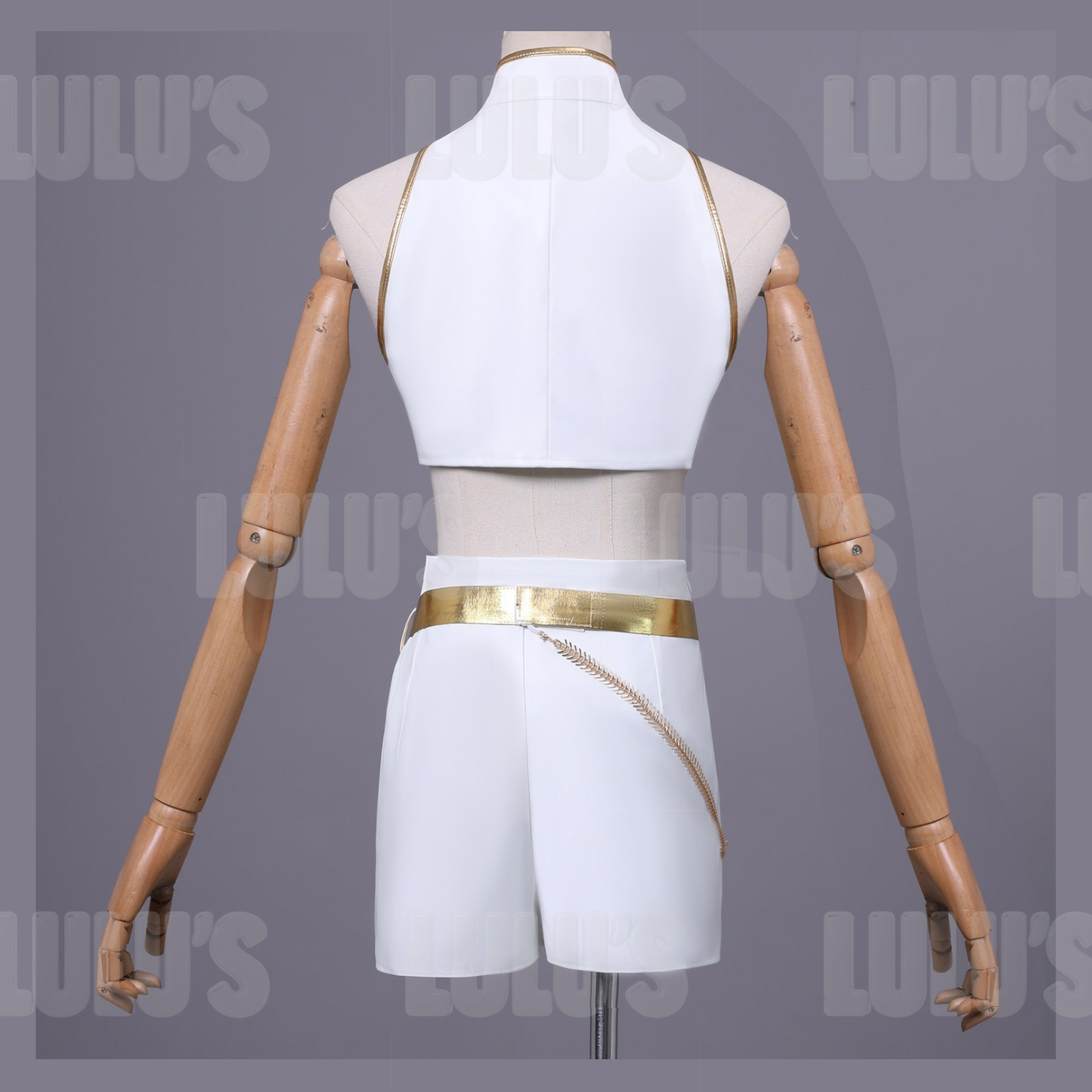 Back view of Rumi White cosplay costume showing cropped top, gold trim, and tailored shorts with belt chain