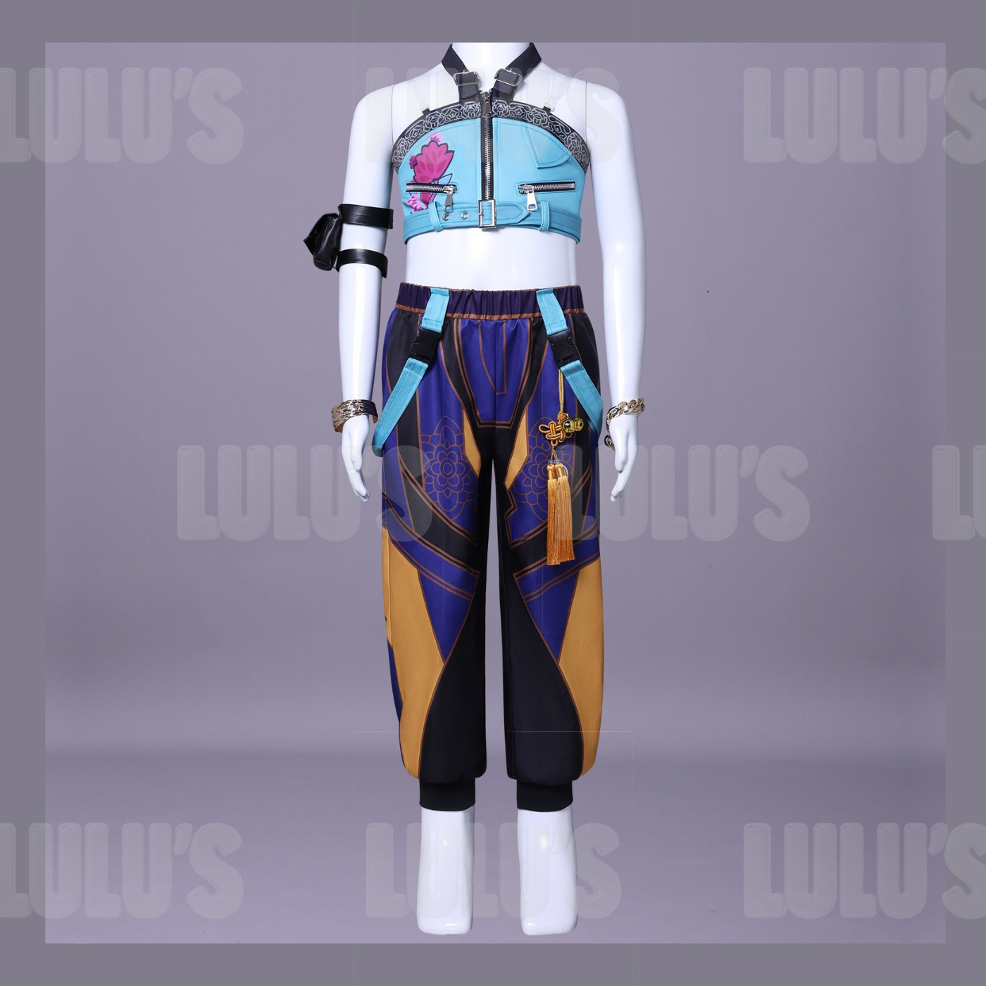Front view of Zoey kids cosplay costume from K-pop Demon Hunters, featuring blue crop top with lotus design and detailed purple and gold pants